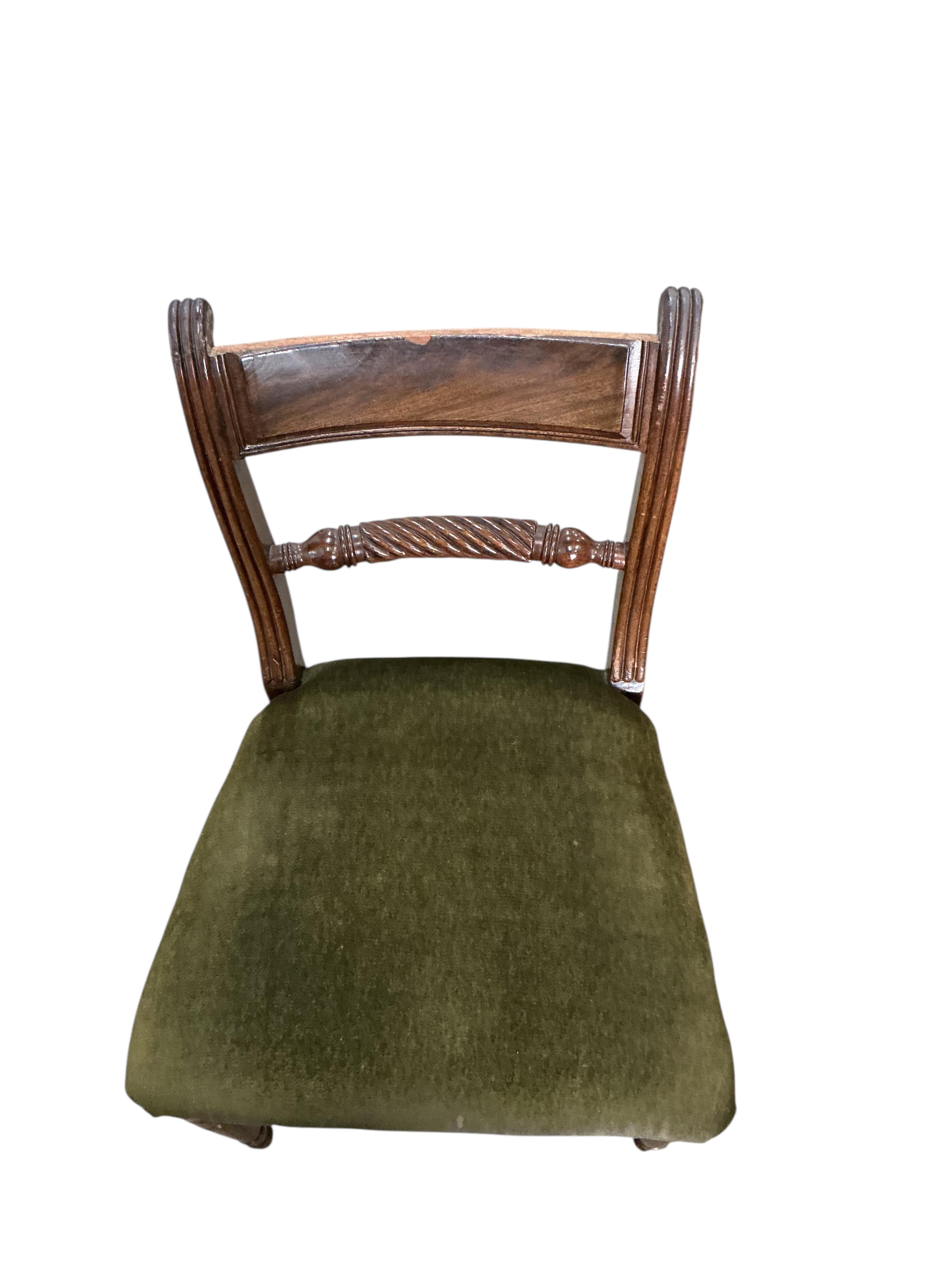 A set of four Regency style mahogany dining chairs, a.f.